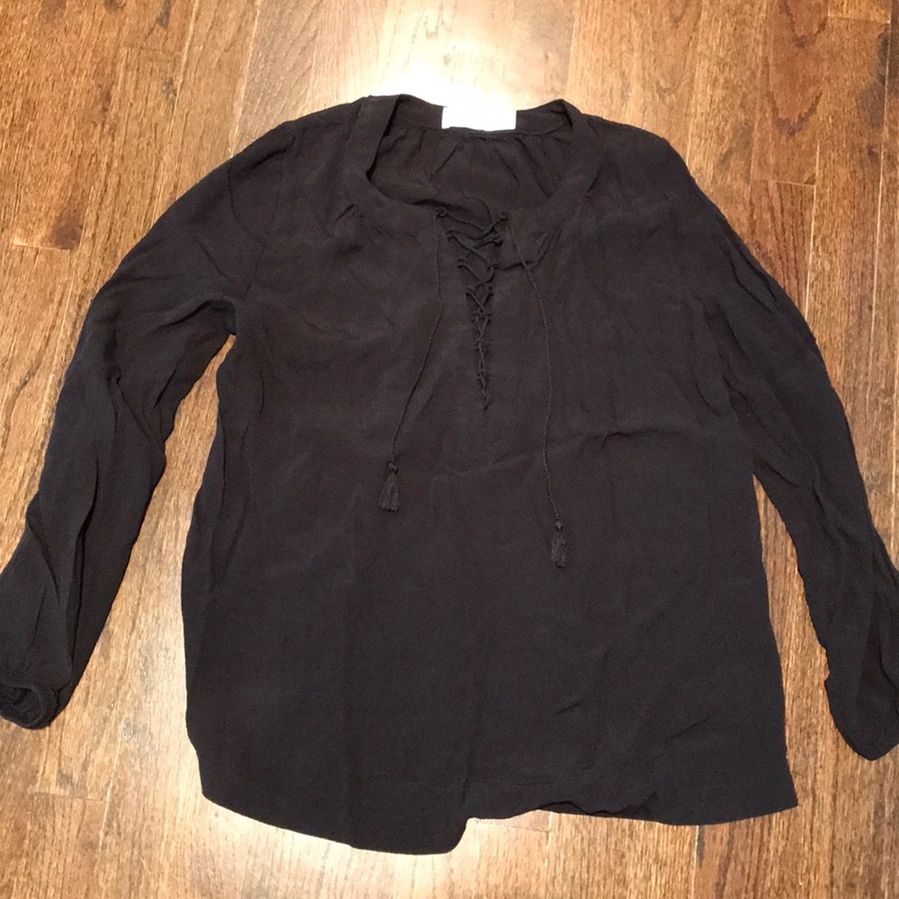 shirt with light, loose fabric and lace up neck